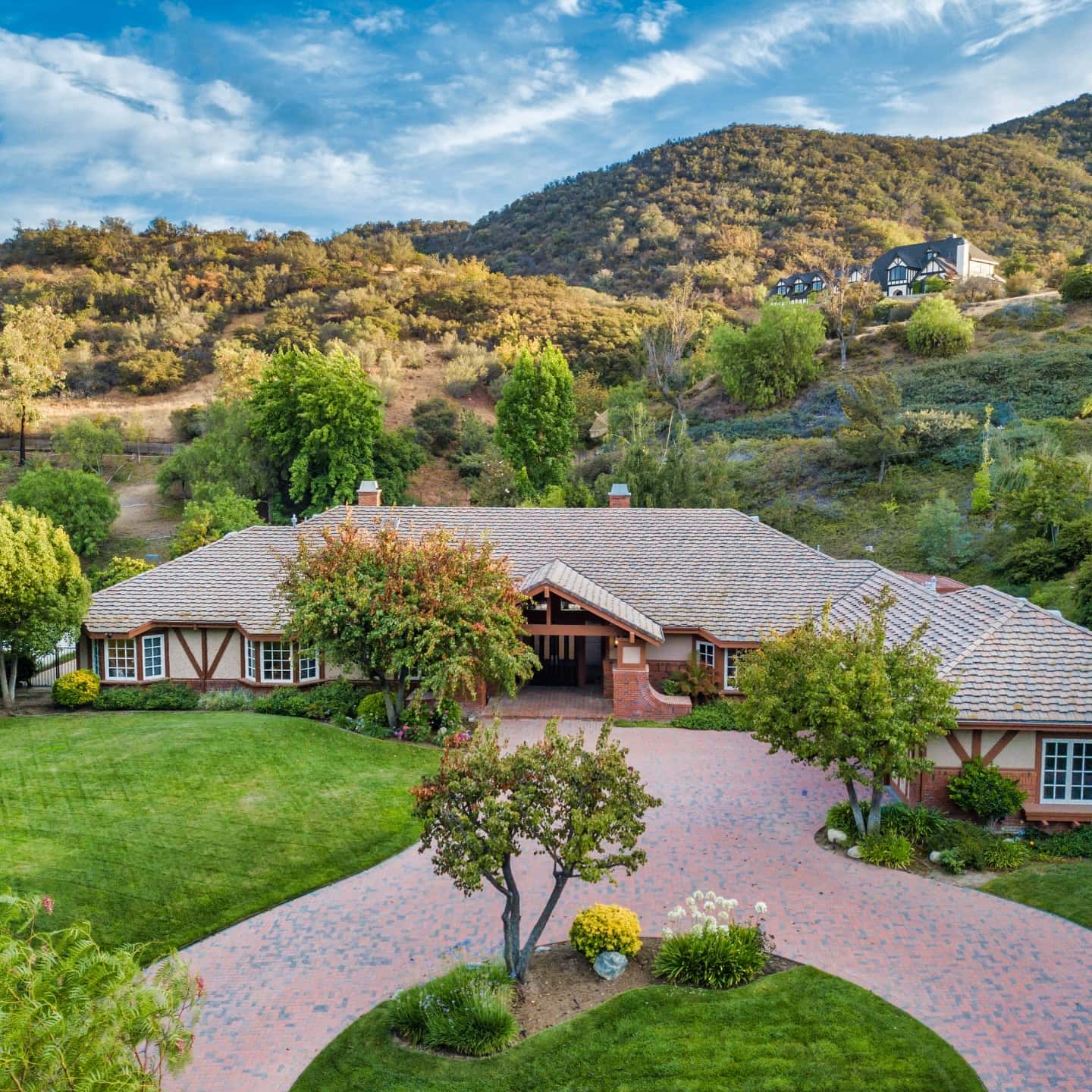 Hillside estate property with mountain views